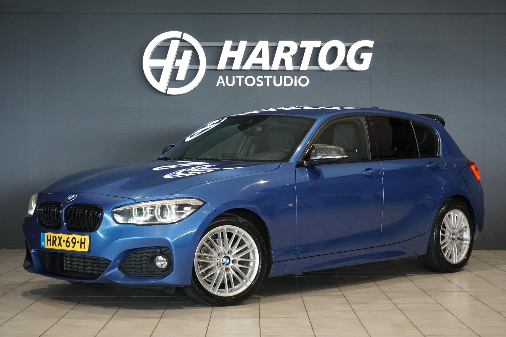 BMW 1-serie 118i High Executive M Sport + CAMERA | HARMAN/KA, Gebruikt, Blauw, Alcantara, Bedrijf