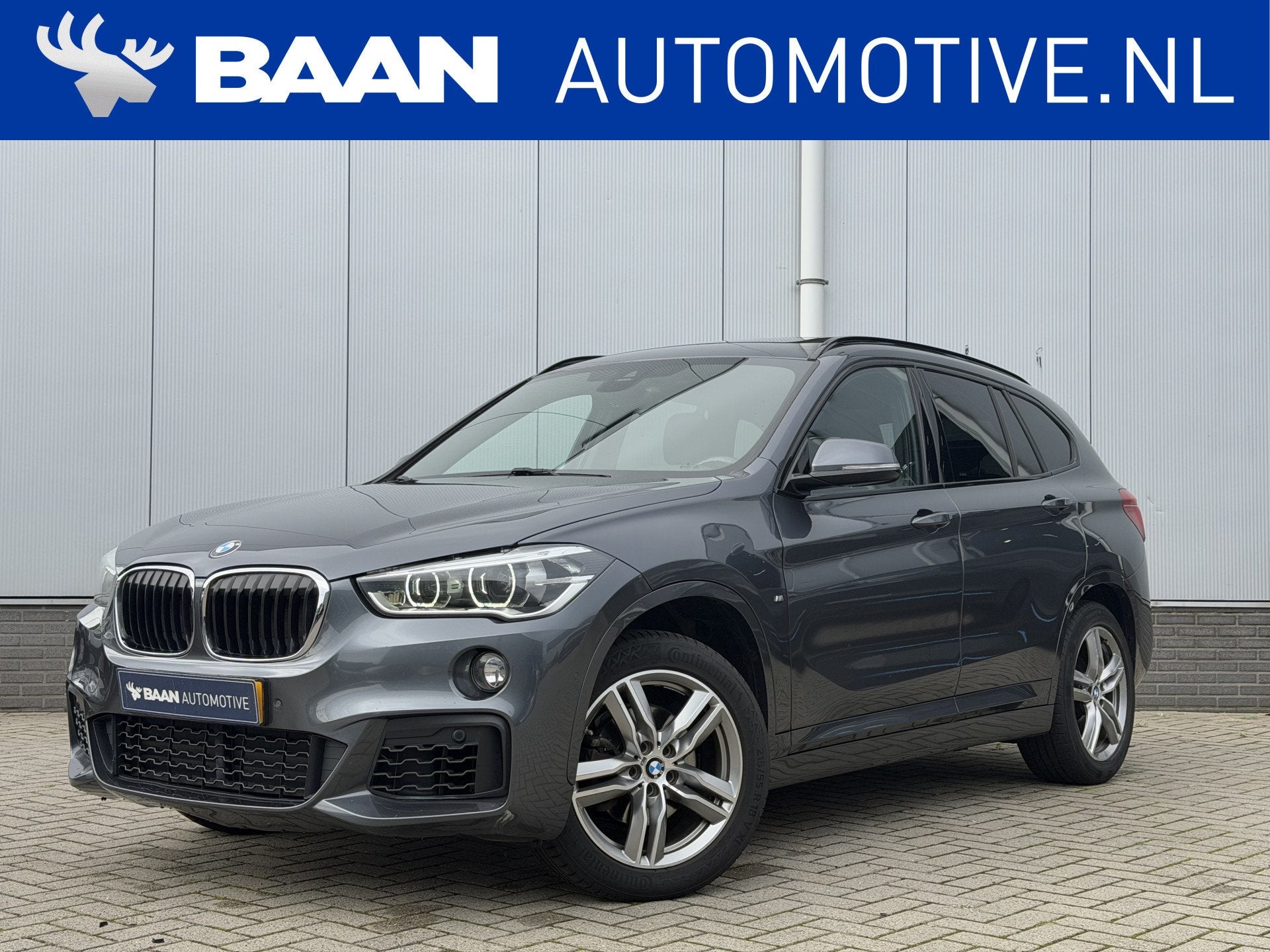 BMW X1 sDrive18i High Executive | M-Sport | Panorama | Trekh, Gebruikt, Euro 6, Alcantara, Grijs