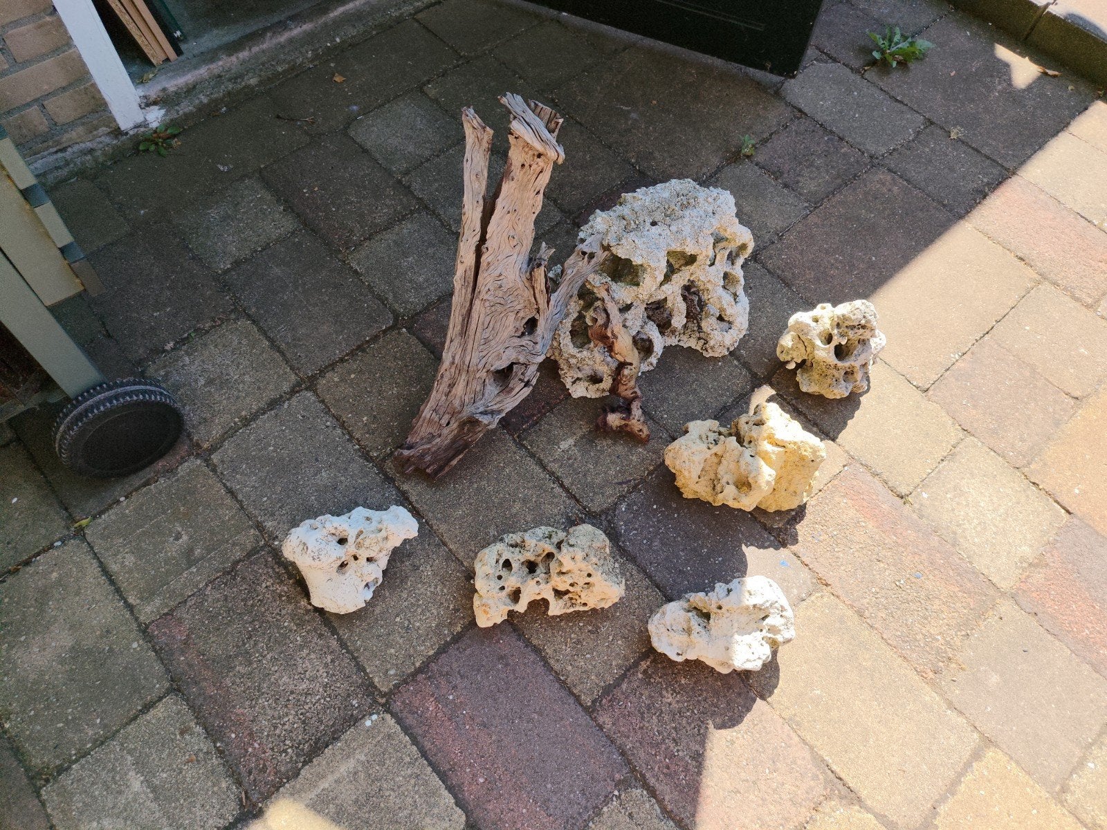 maansteen en kienhout, Ophalen