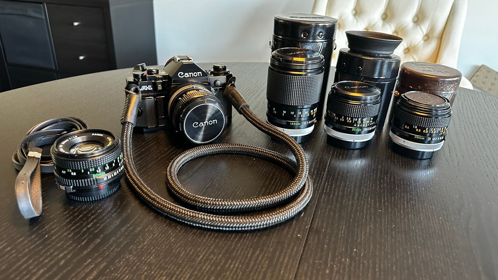 Canon A-1 Spiegelreflexcamera met diverse lenzen, Ophalen of Verzenden, Gebruikt, Spiegelreflex, Canon