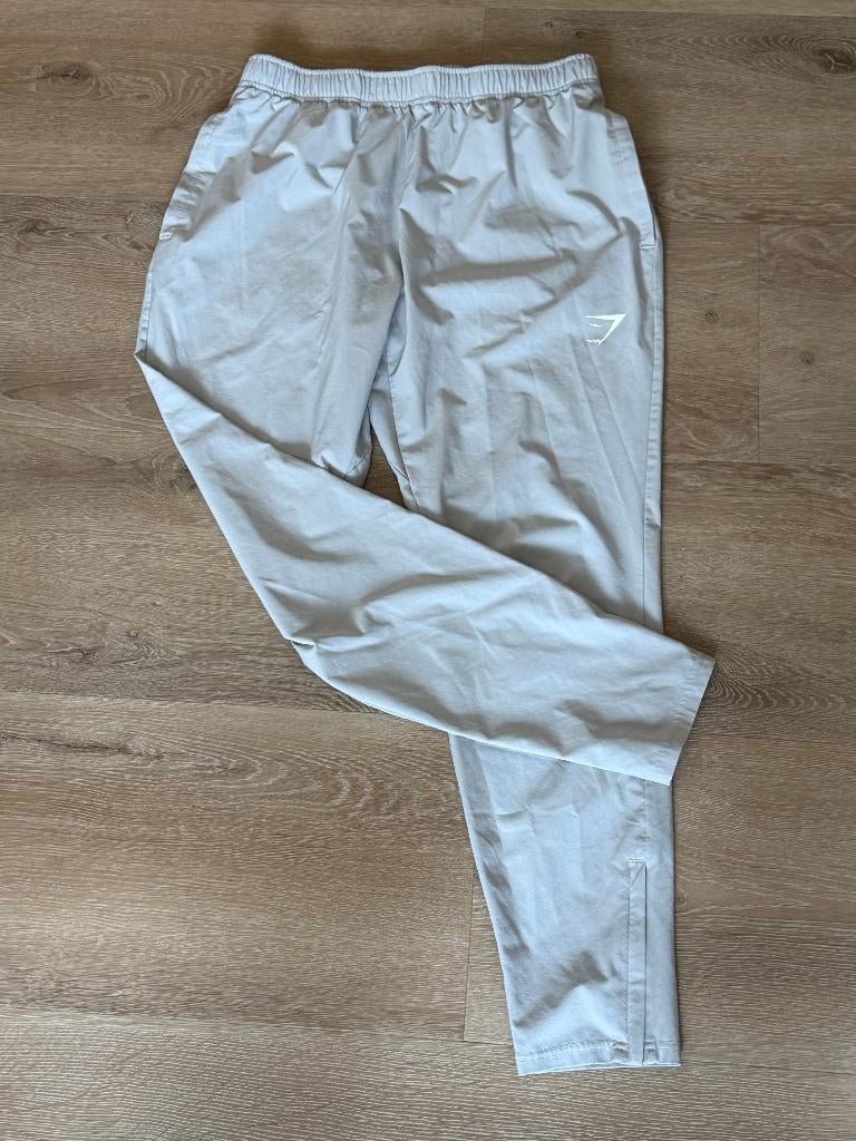Gymshark. Traingsbroek. Maat M. Lichtgrijs., Kleding | Heren, Maat 48/50 (M), Gymshark, Ophalen of Verzenden, Zo goed als nieuw