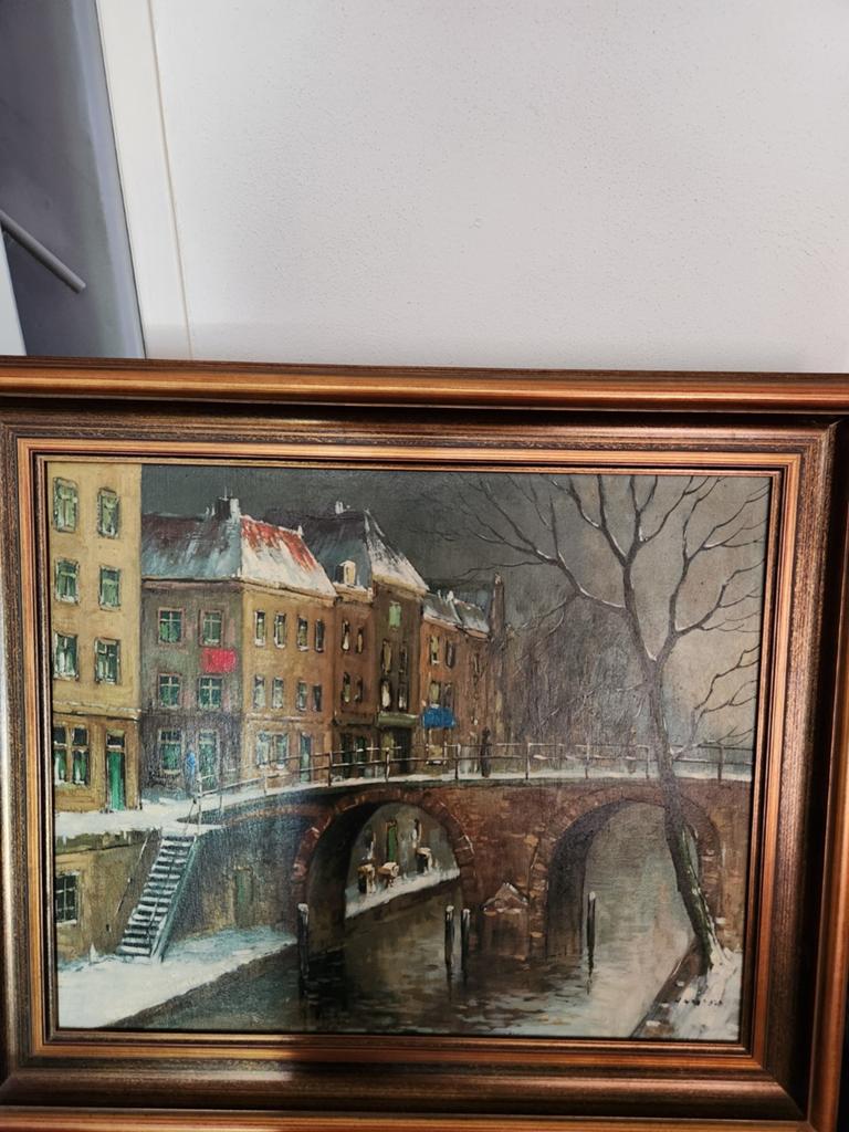 Schilderij Amsterdamse gracht in de winter, Ophalen