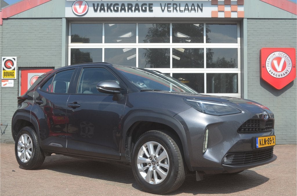 Toyota Yaris Cross 1.5 Hybrid 12 mnd. gar. (bj 2023), Auto's, 12 maanden, Stof, Gebruikt, 23 km/l