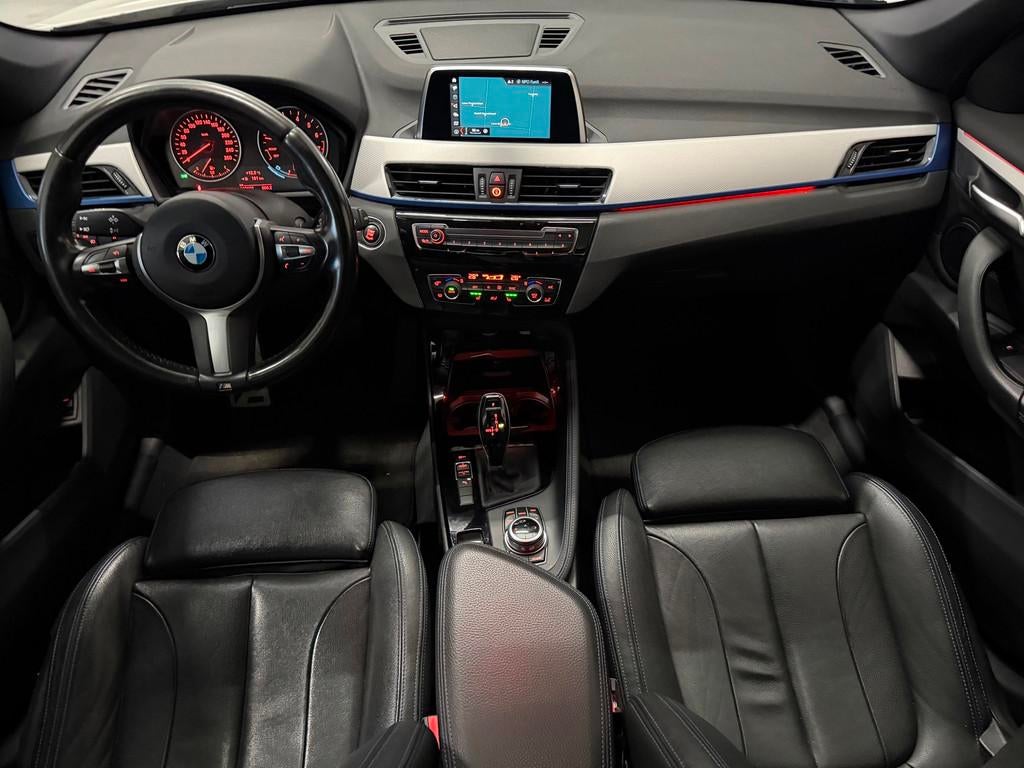 BMW X1 SDrive20i High Executive M-pakket|Stoelvw|Panorama|Tr, 1998 cc, Met garantie (alle), Wit, Leder