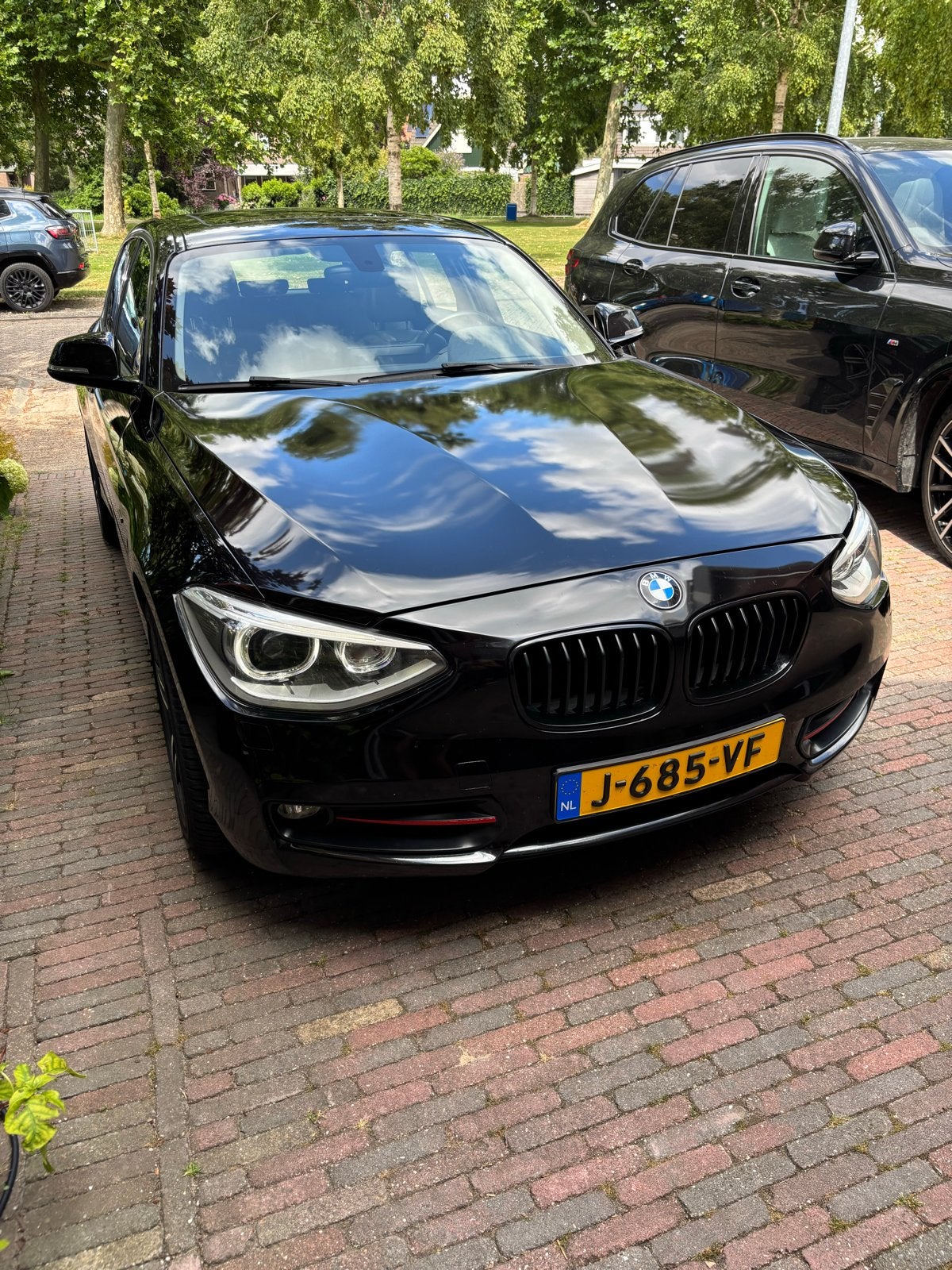 BMW 1-Serie 116I 100KW 5DR Aut8 2013 Zwart, Auto's, 4 cilinders, Zwart, 1200 kg, 650 kg