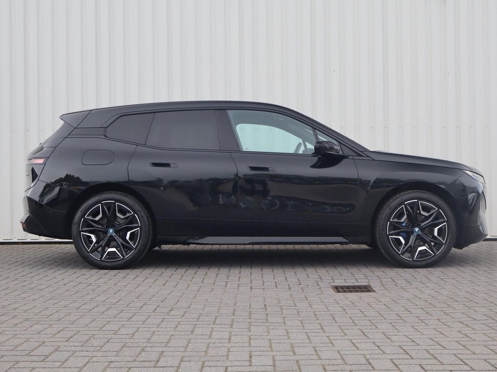 BMW iX xDrive50 524pk High Executive 112 kWh | SoH 96% | Har, Auto's, Automaat, Gebruikt, 523 pk, Zwart