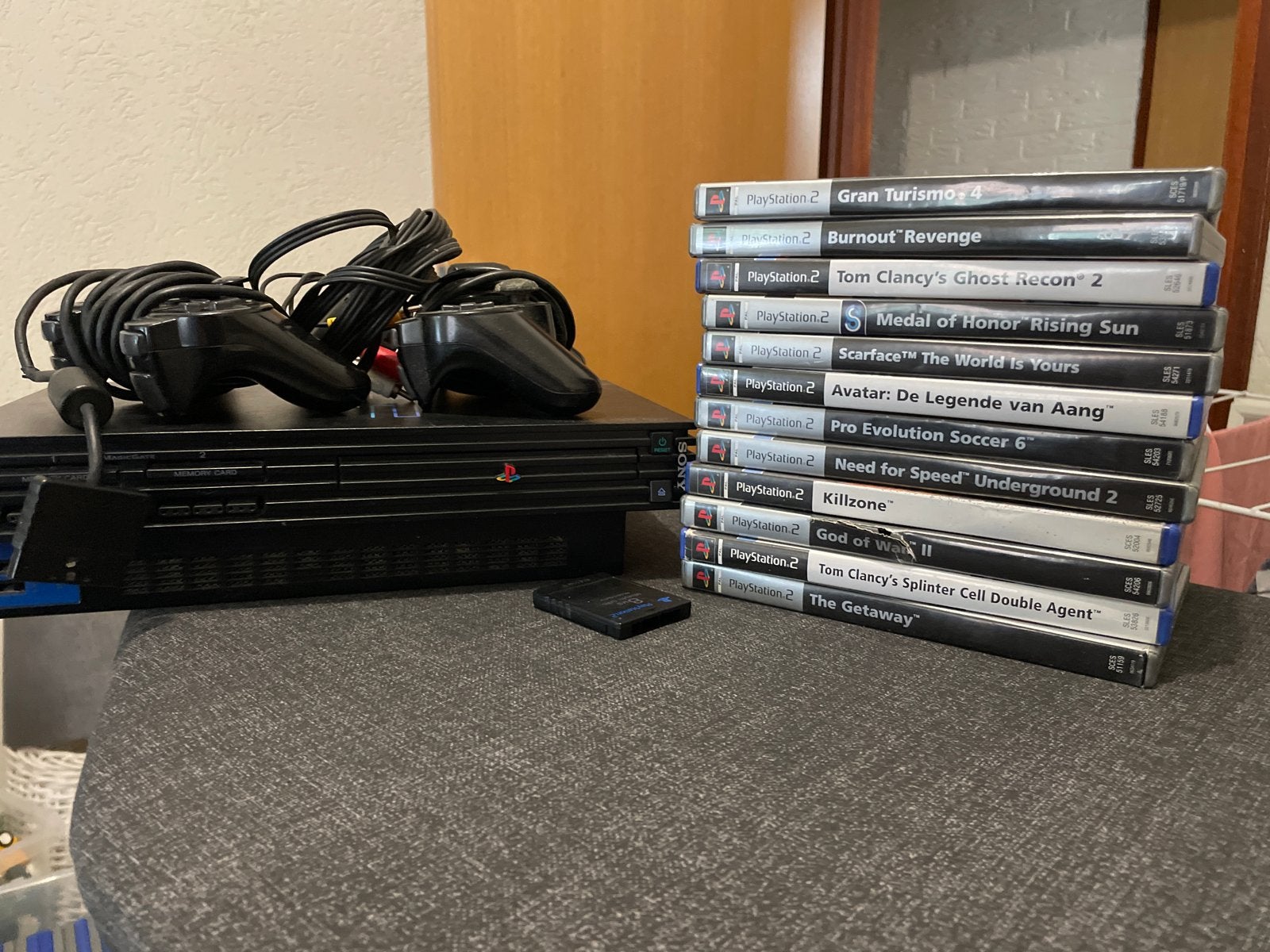 PlayStation 2 (PS2) met 2 controllers en 12 games, Spelcomputers en Games, Met 2 controllers, Ophalen of Verzenden, Gebruikt, Met games