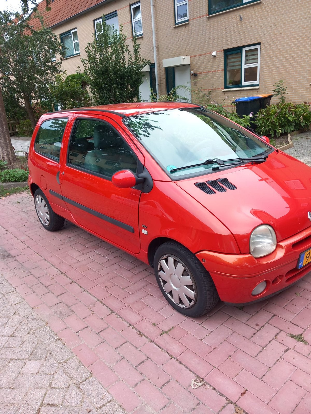 Renault Twingo 1.2 55KW Auth E3 2005 Rood, Voorwielaandrijving, 4 cilinders, 4 stoelen, Leder en Stof