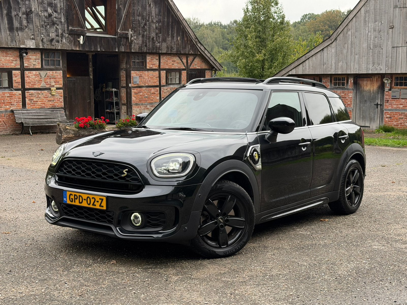 Mini Countryman 1.5 Cooper S E ALL4 JCW Panoramadak Leer, Auto's, Automaat, Dealer onderhouden, 125 pk, Countryman
