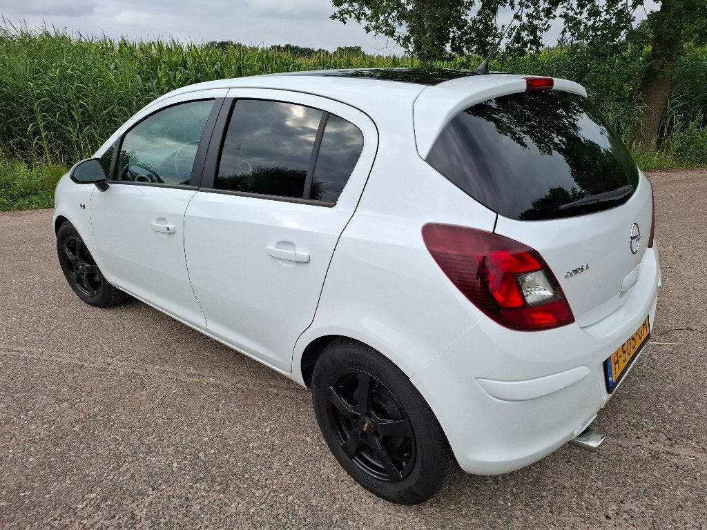 Opel Corsa 1.4 Ecotec 64KW 5D 2010 Wit (Color Edition), Auto's, Opel, Voorwielaandrijving, Euro 5, 4 cilinders, Handgeschakeld