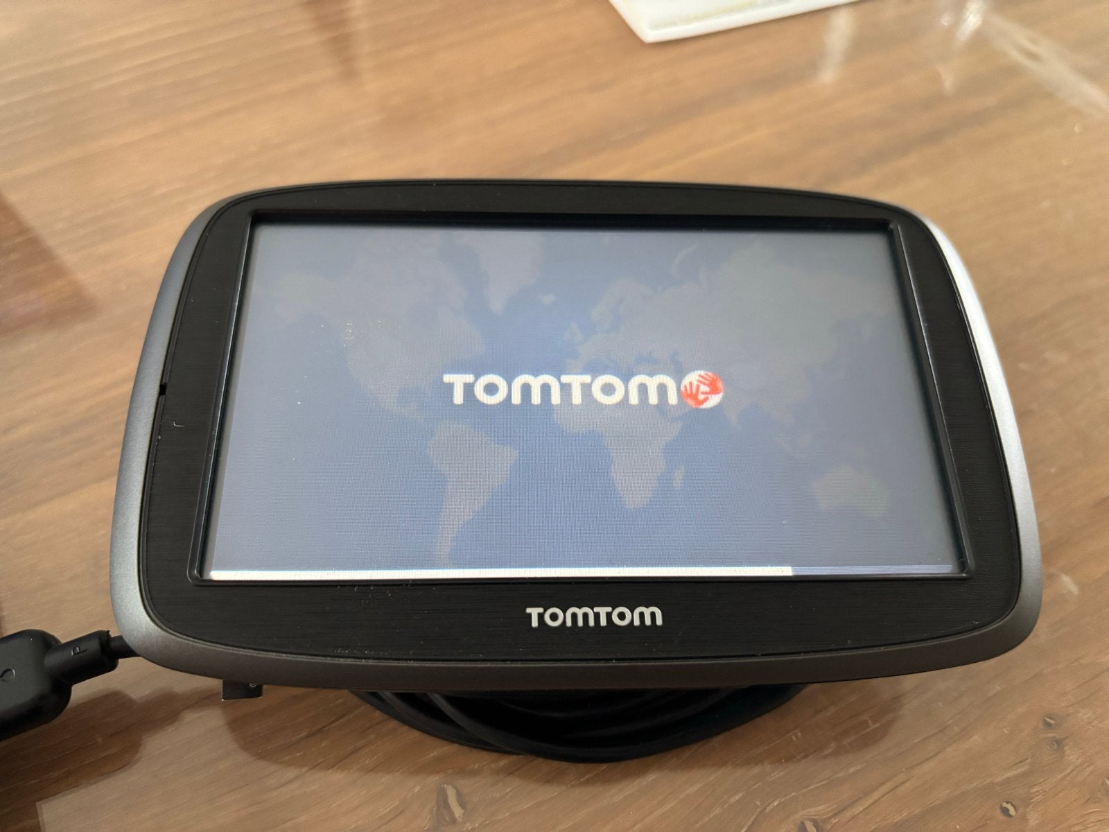 TomTom GO navigatiesysteem met hoesje, Auto diversen, Autonavigatie, Ophalen of Verzenden, Gebruikt