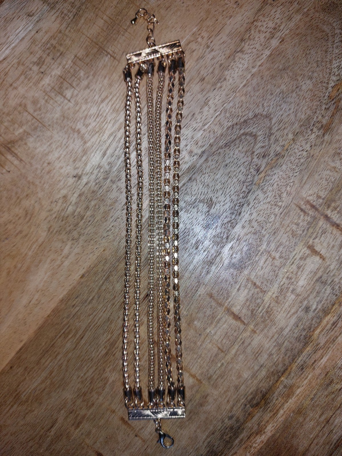 Goudkleurig armbandje met meerdere schakels, Ophalen of Verzenden, Zo goed als nieuw, Goud, Overige materialen