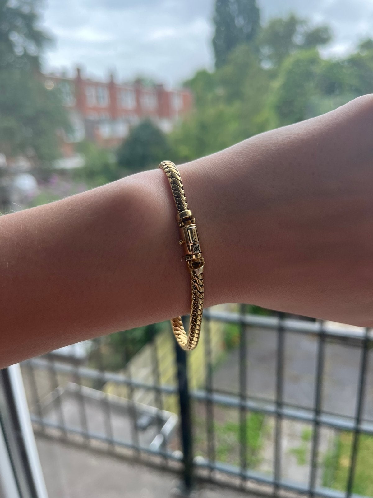 Buddha to buddha armband., Sieraden, Tassen en Uiterlijk, Armbanden, Ophalen of Verzenden, Gebruikt, Goud, Zilver