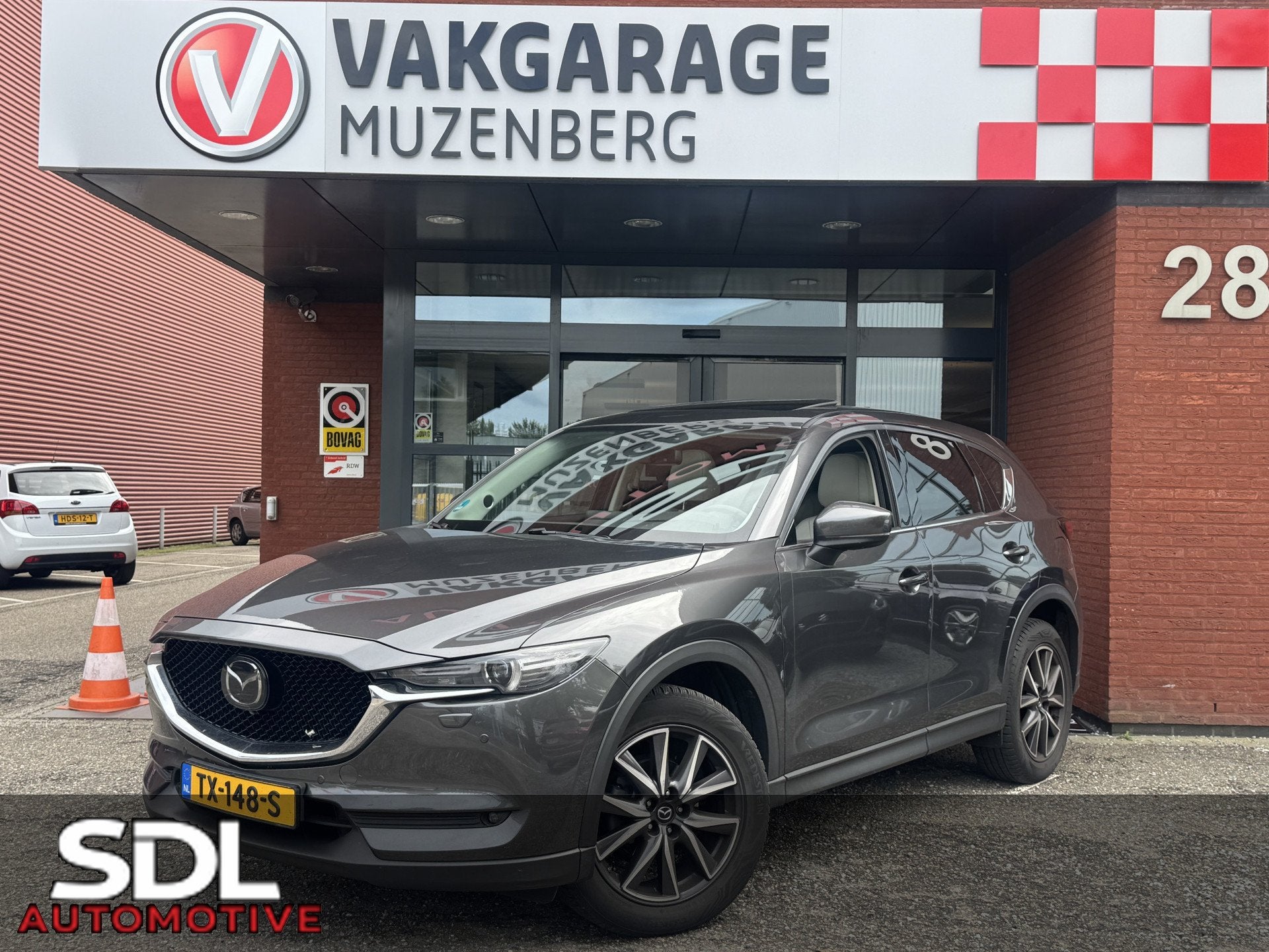 Mazda CX-5 2.5 SkyActiv-G 194 GT-M // NAVI // BOSE AUDIO //, Auto's, Dealer onderhouden, 1490 kg, Gebruikt, 4 cilinders