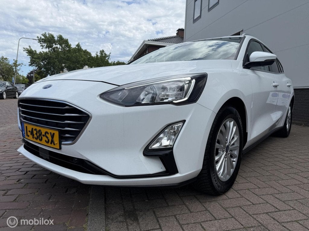 Ford Focus Wagon 1.0 EcoBoost Titanium X Business, Auto's, Ford, 1328 kg, 125 pk, Gebruikt, Euro 6
