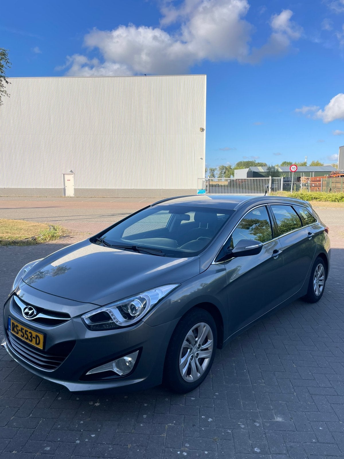 Hyundai i40 1.6 GDI 135PK 2013 Grijs, Auto's, Hyundai, Voorwielaandrijving, Euro 5, Stof, 4 cilinders