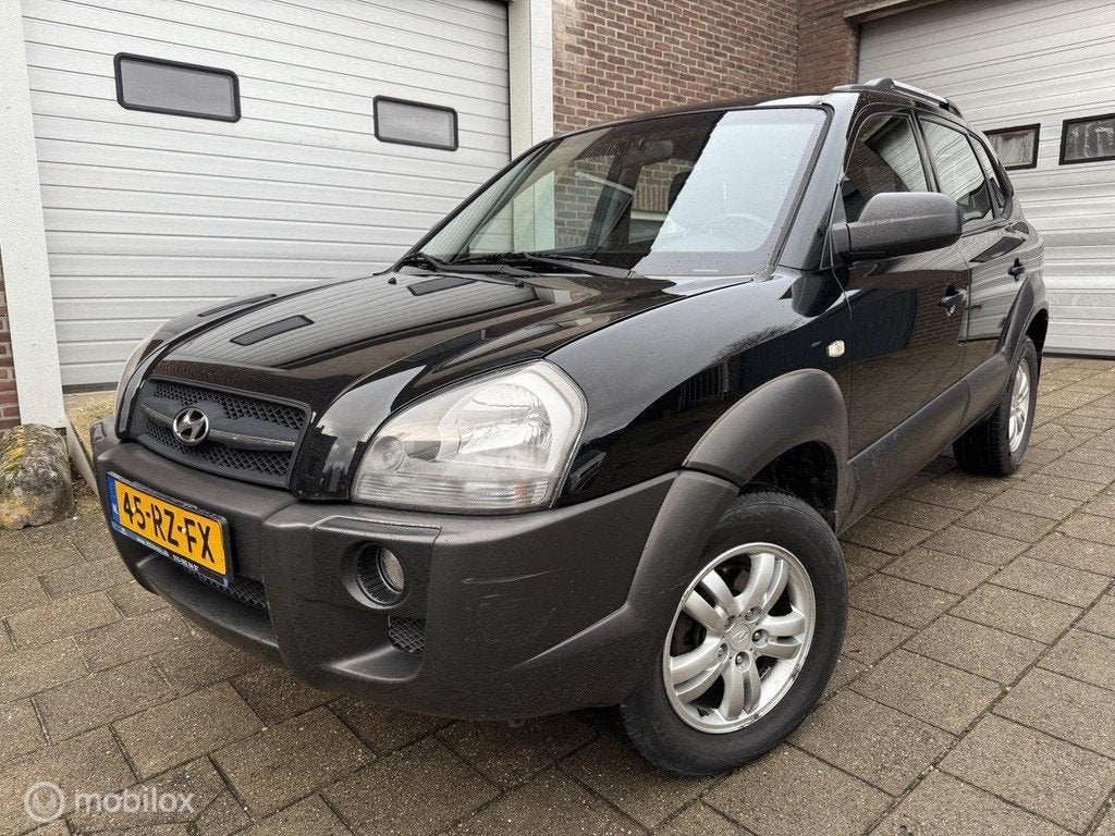 Hyundai Tucson 2.0i Dynamic, Gebruikt, Zwart, Origineel Nederlands, Handgeschakeld