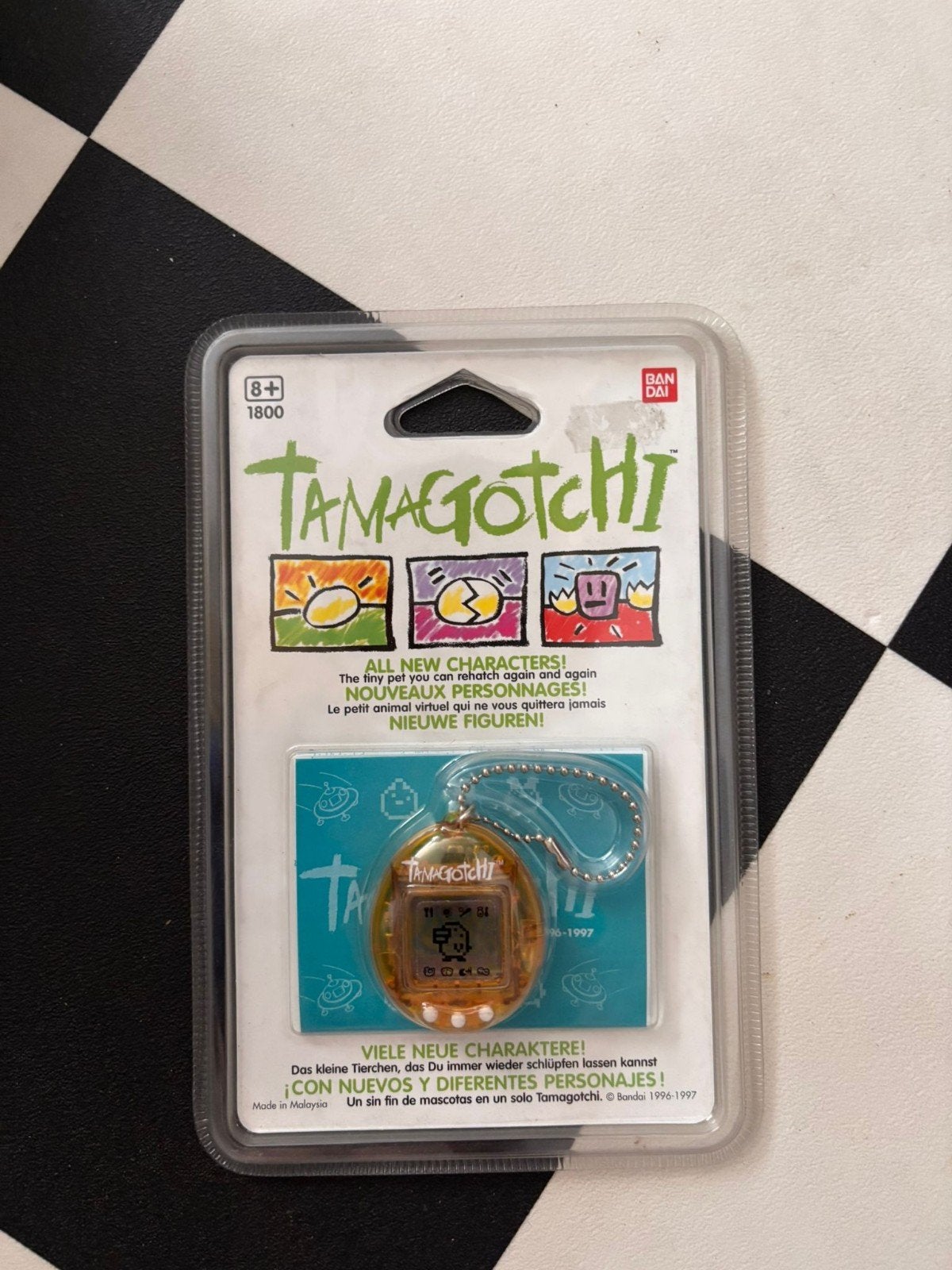 Nieuwe Tamagotchi Bandai 1997 - Oranje, Kinderen en Baby's, Speelgoed | Overig, Ophalen of Verzenden