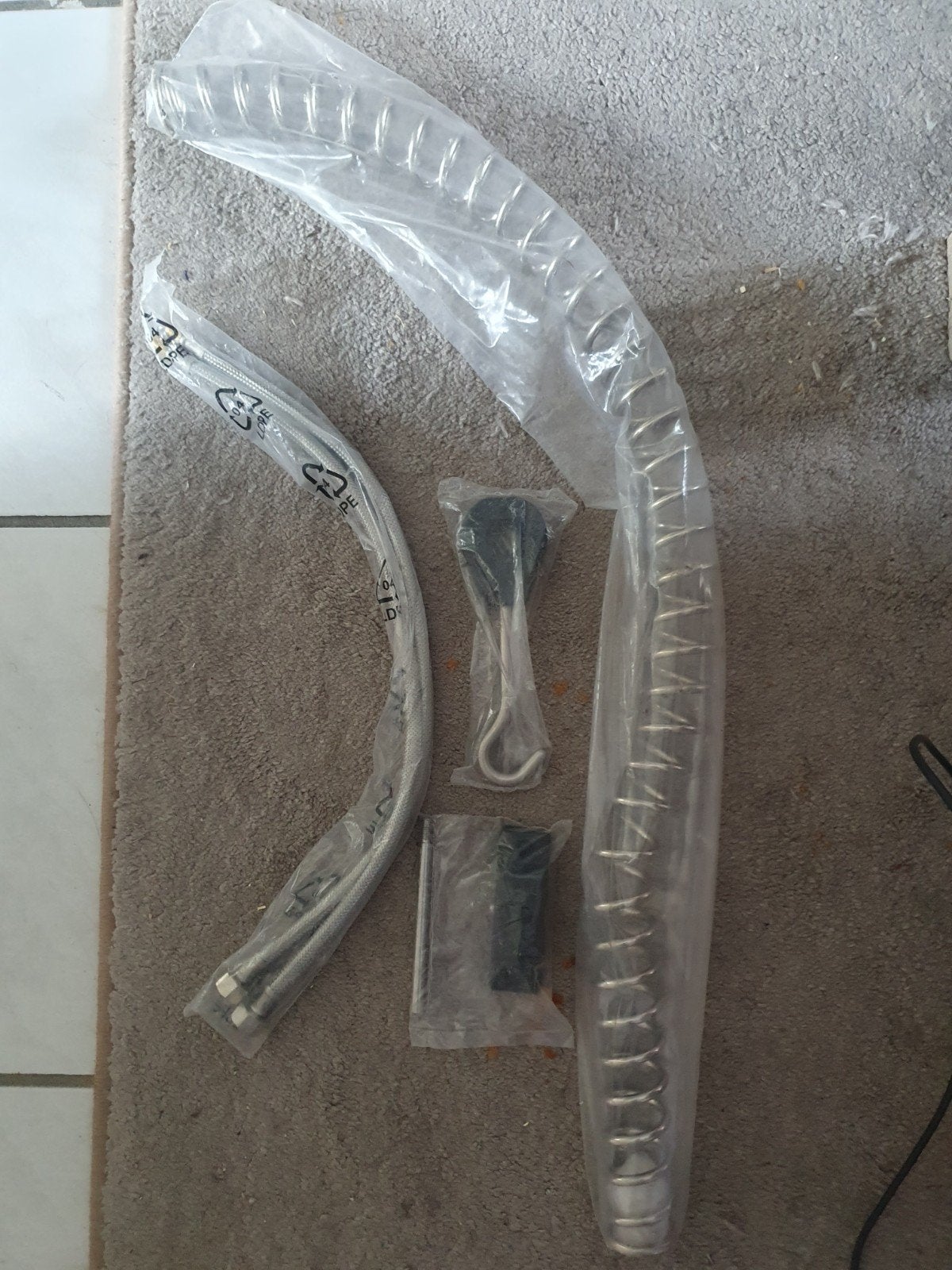 Nieuwe voorspoeldouche onderdelen, Ophalen
