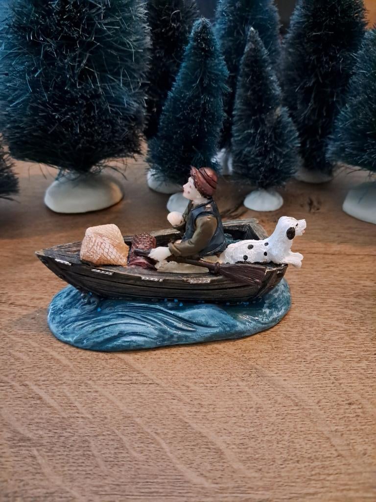 Intratuin man met hond in een boot, Ophalen