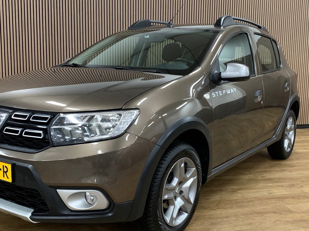 Dacia Sandero 0.9 TCe SL Stepway|Navigatie|133000KM|Airco|, Auto's, Voorwielaandrijving, 898 cc, Stof, Bruin