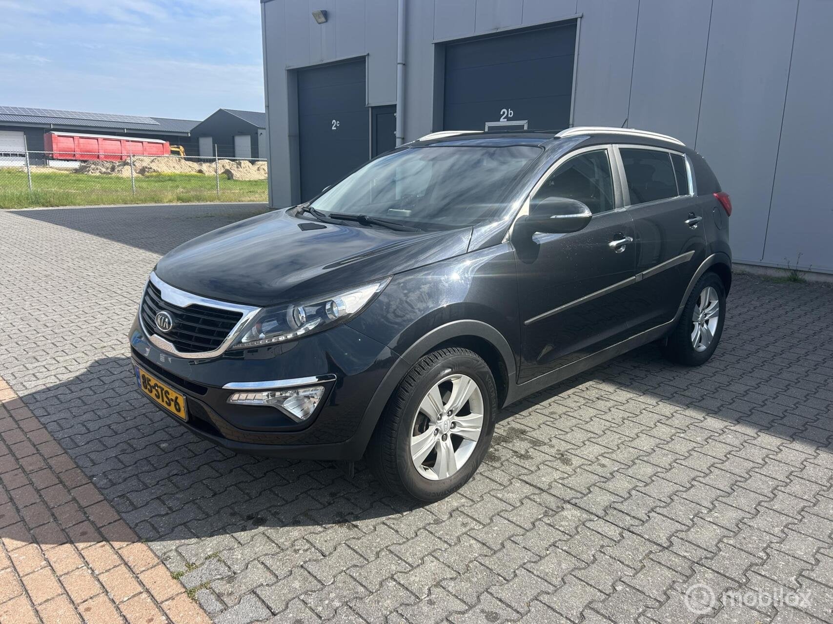 Kia Sportage 2.0 X-ecutive Plus Pack Automaat, Auto's, Gebruikt, 4 cilinders, Met garantie (alle), Origineel Nederlands