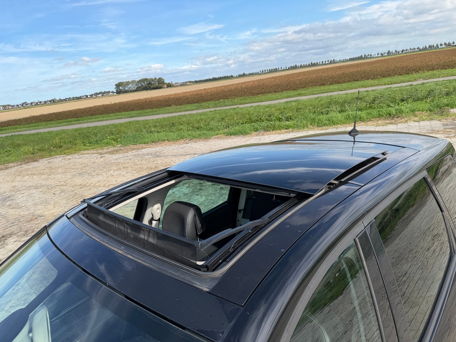 Foto 9 van Renault Grand Scenic 1.4 TCE 96KW 7P 2011 Zwart