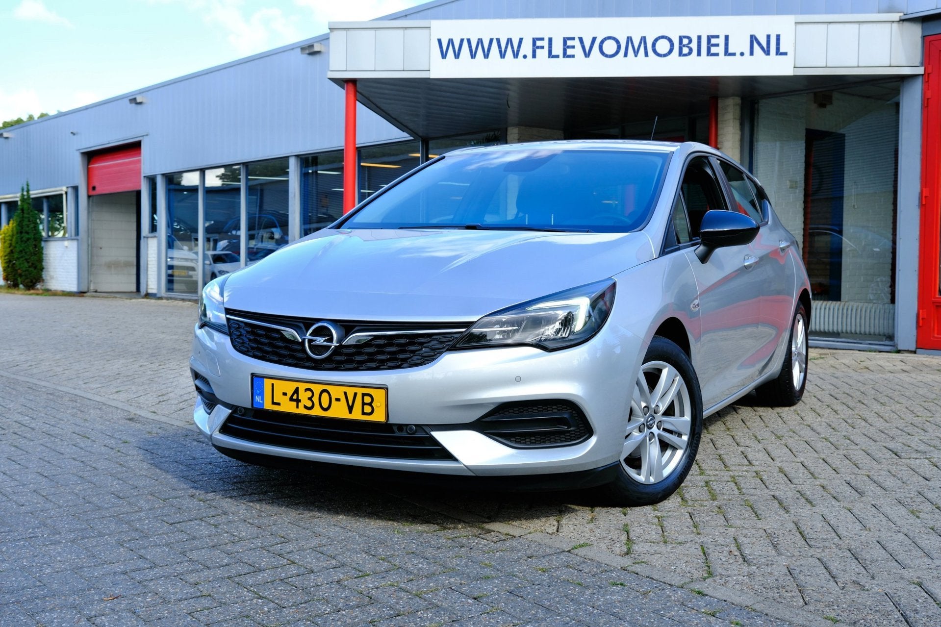 Opel Astra 1.2 Edition *50.000km!* Airco|CarPlay|LMV|PDC, Voorwielaandrijving, 1350 kg, Stof, Gebruikt