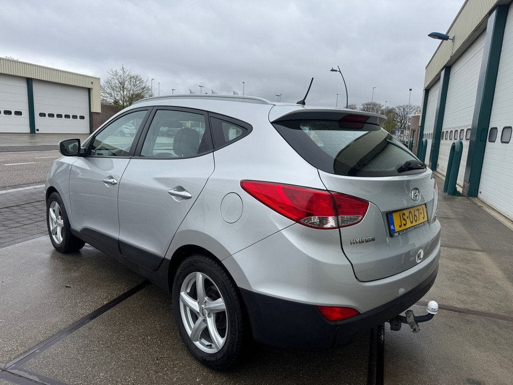Hyundai Ix35 1.6i GDI Style, Auto's, Hyundai, Euro 5, 135 pk, 4 cilinders, Leder en Stof
