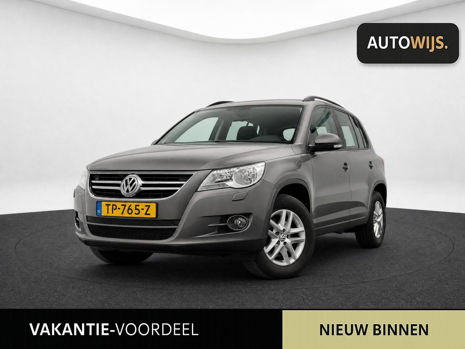 Volkswagen Tiguan 1.4 TSI Sport&Style|150PK|CRUISE|STOELVERW, Auto's, Voorwielaandrijving, Euro 5, Zwart, 4 cilinders