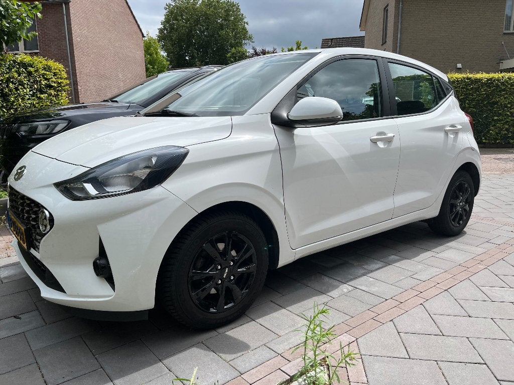 Hyundai i10 1.0i 67pk 2022 Wit | 58.750 km, Auto's, Hyundai, Stof, 899 kg, 4 stoelen, Wit