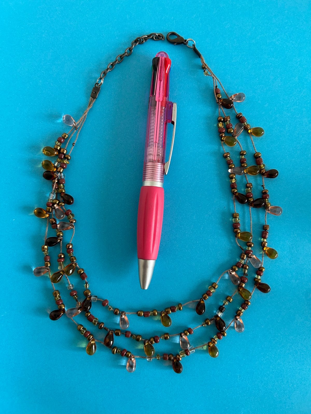 Vintage Ketting met kralen en hangers in aardetinten, Overige materialen, Bruin, Ophalen of Verzenden, Verstelbaar
