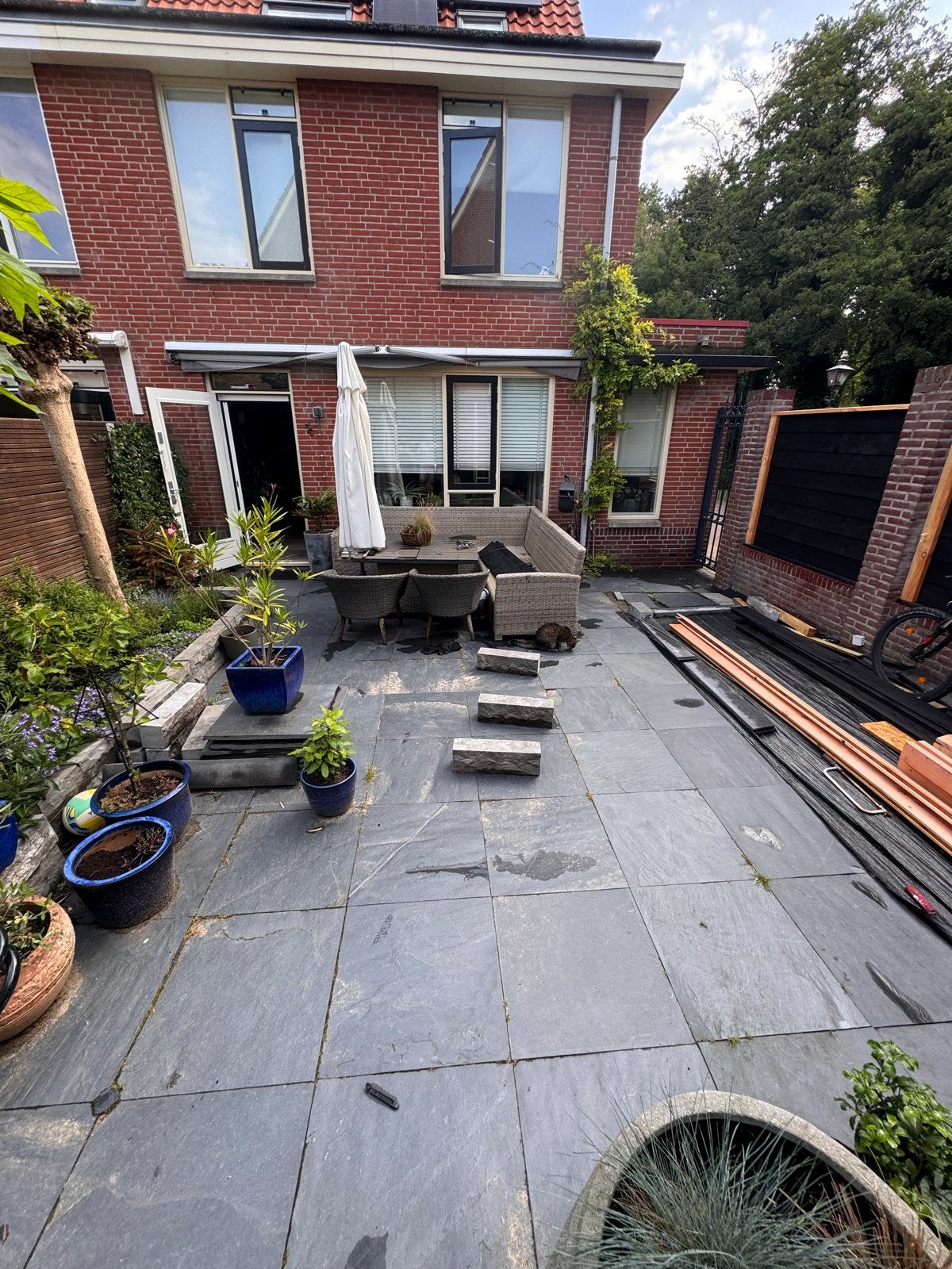 Natuursteen terrastegels, donkergrijs, gebruikt, Tuin en Terras, Ophalen, Gebruikt, Gecoat, Terrastegels