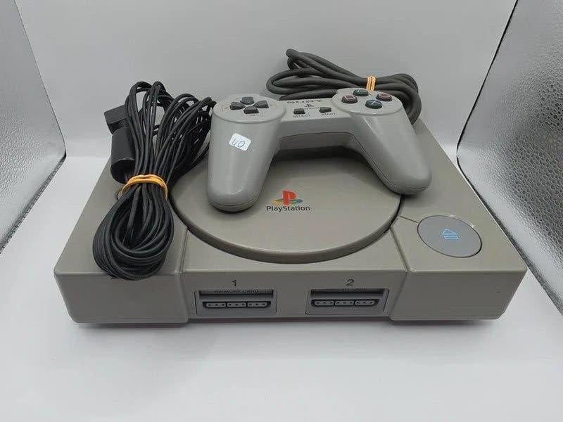 Playstation 1 / Controller / AV Cable, Sony City 1-7-1 Konan, Minato-ku Tokyo 108-0075 Japan, support@playstation.com,, Gebruikt