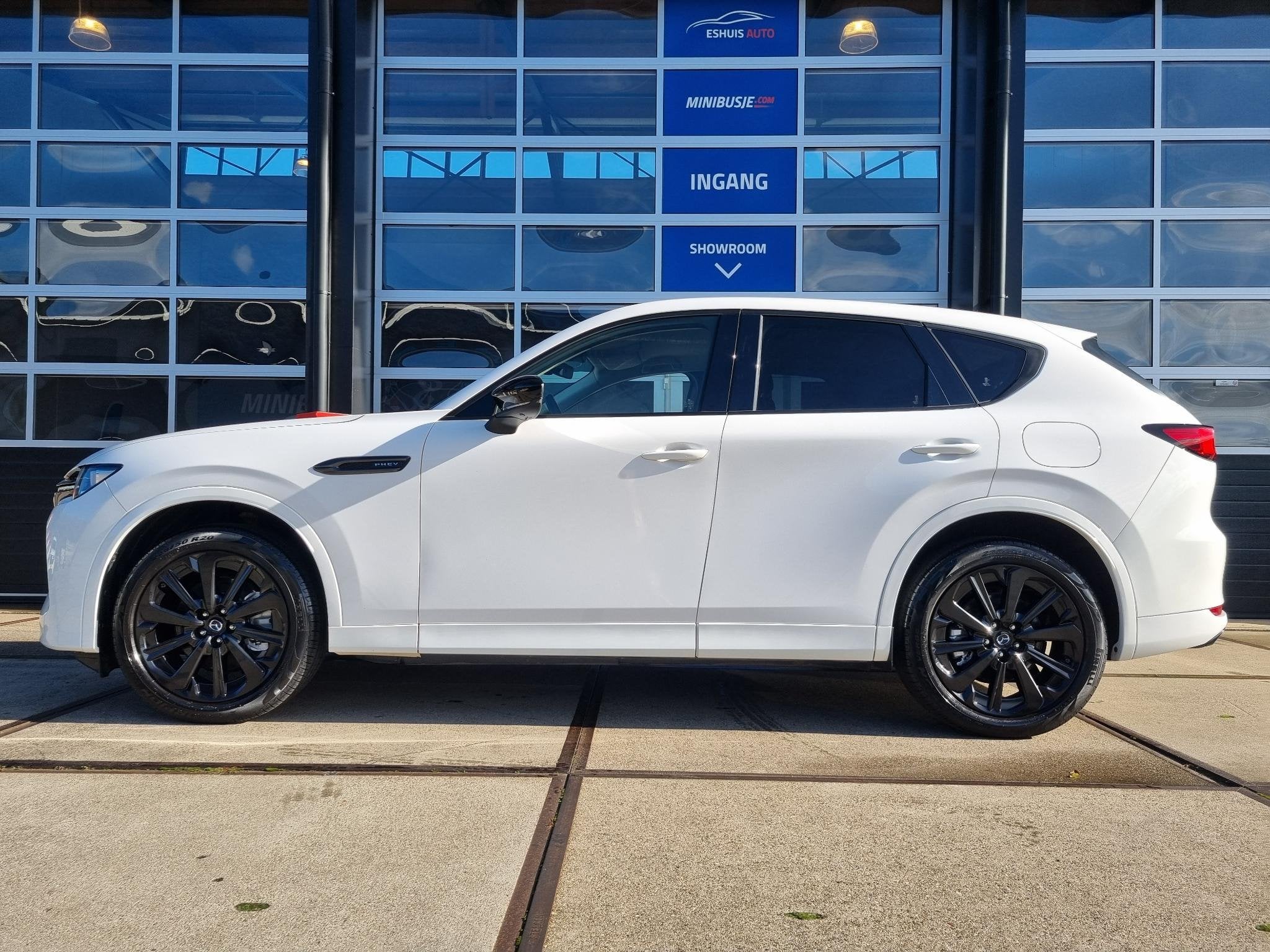 Mazda CX-60 2.5 e-SkyActiv PHEV AWD Homura LEER / BOSE AUDIO, Auto's, Dealer onderhouden, Stof, Gebruikt, 4 cilinders