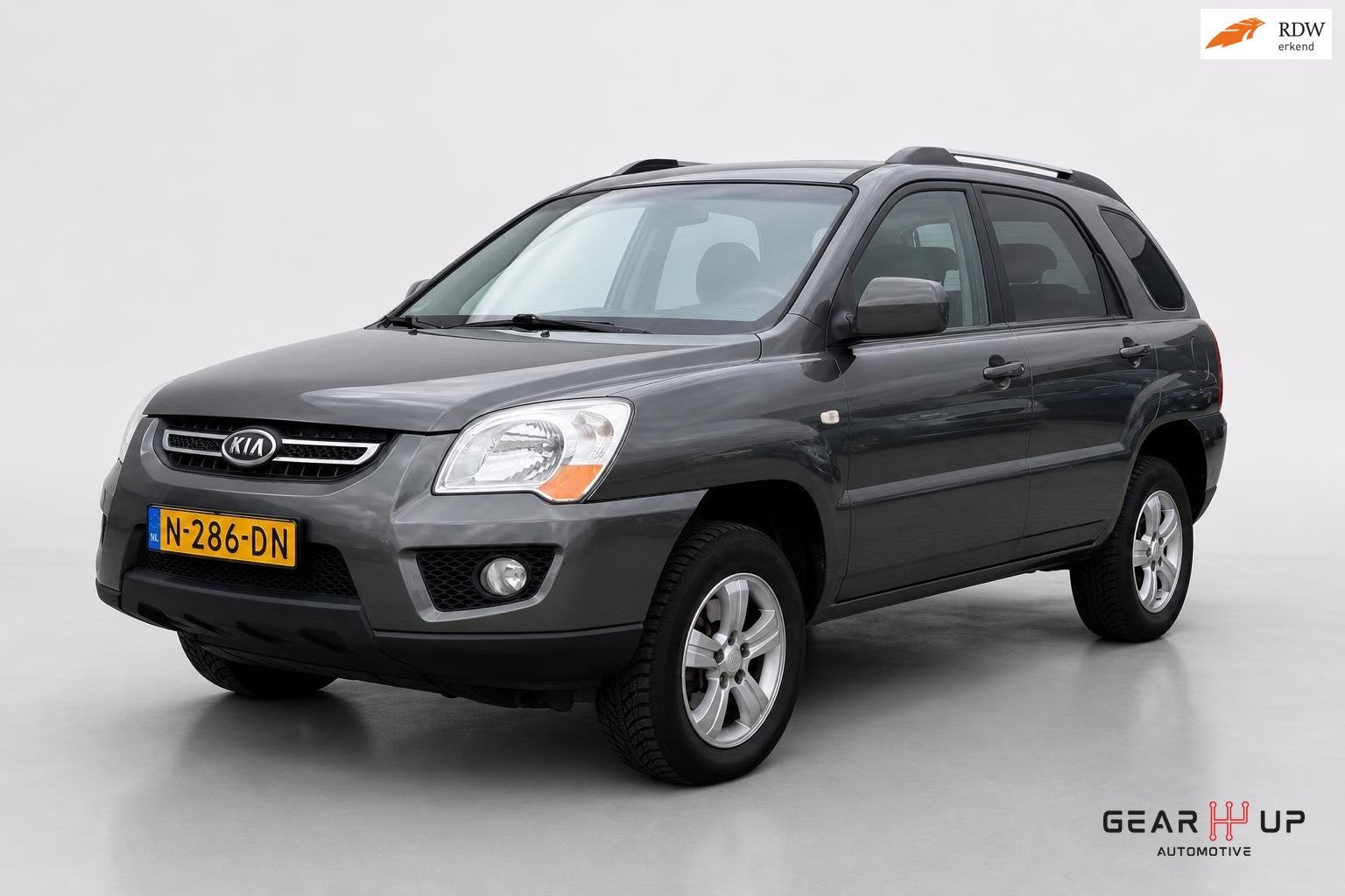 Kia Sportage 2.0 CVVT X-clusive AIRCO|CRUISE|LEER|LM|TREKH|, Auto's, 1442 kg, Gebruikt, 4 cilinders, Stoelverwarming