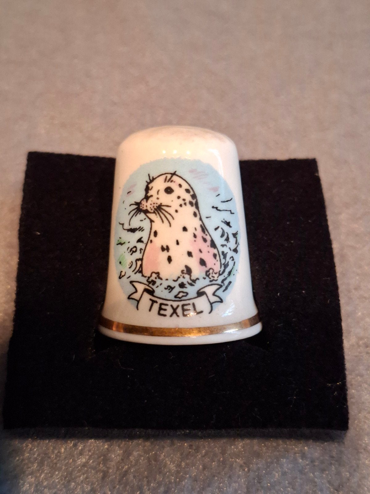 Vingerhoedje Texel Zeehondje, Ophalen of Verzenden, Zo goed als nieuw, Porselein, Nederland