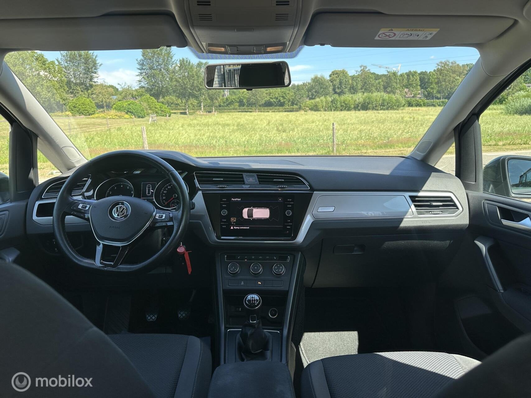 Volkswagen Touran 1.2TSI Comfortline 7-personen Trekhaak✅, Auto's, Volkswagen, Voorwielaandrijving, Stof, Gebruikt, Zwart