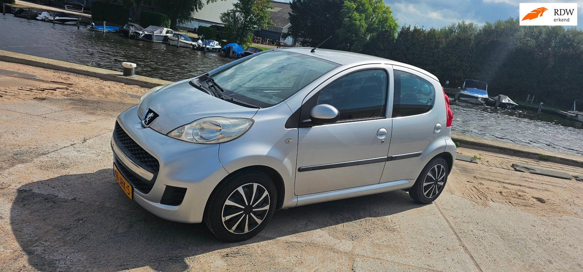 Peugeot 107 1.0-12V Sublime 5drs airco lage kms, Voorwielaandrijving, Gebruikt, 4 stoelen, 68 pk