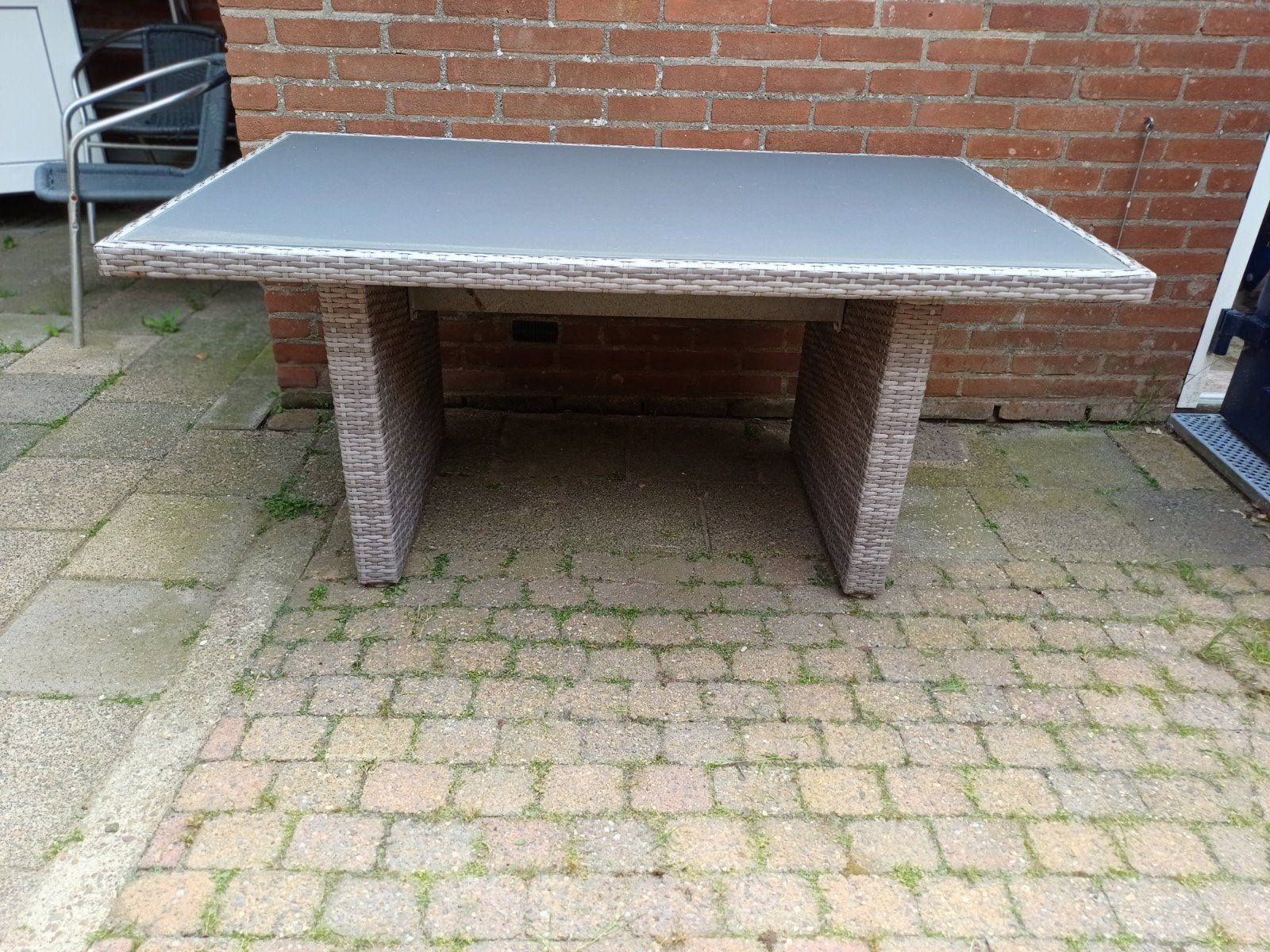 Tuintafel, kunststof rotan,glazen top ,grijs., Ophalen, Gebruikt, Rechthoekig, Kunststof