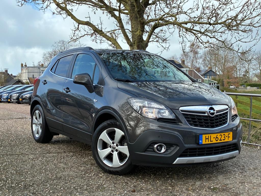 Opel Mokka 1.4 T Cosmo | Cruise + Clima + Half leder nu €, Voorwielaandrijving, Gebruikt, 4 cilinders, Leder en Stof