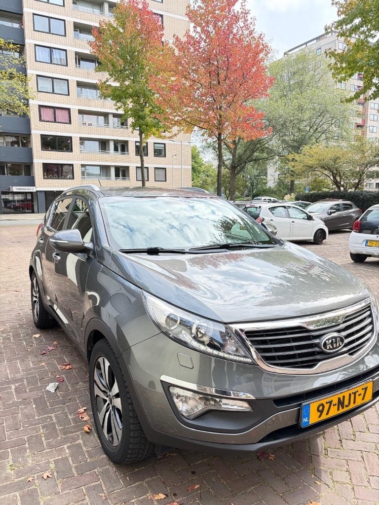 Kia Sportage 2.0 Cvvt 2WD AUT 2010 Grijs, Auto's, 1998 cc, Zwart, 4 cilinders, Elektrische ramen