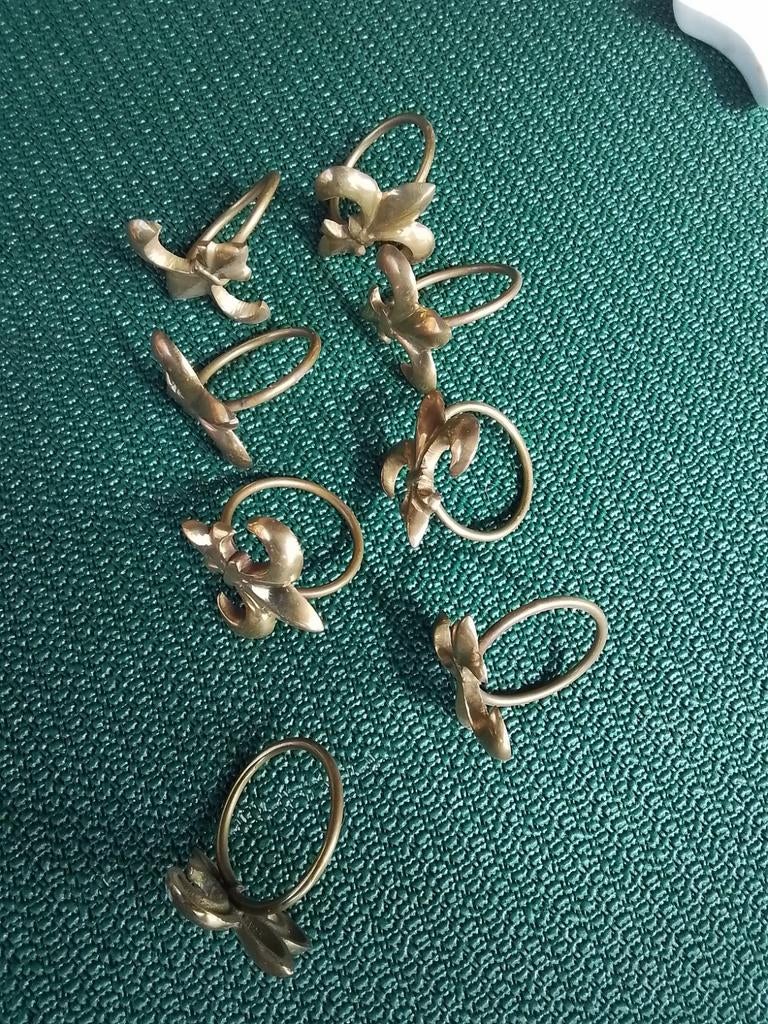 Set van 7 vintage messing servetringen Fleur de Lis, Ophalen of Verzenden