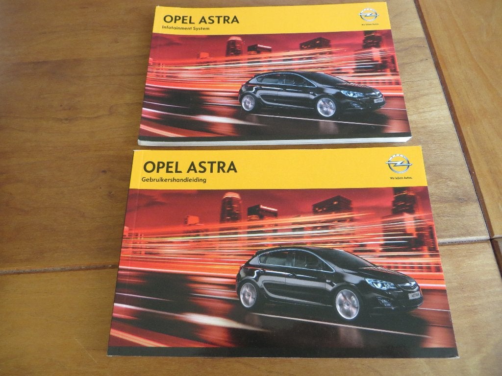 Instructieboek Opel Astra, Astra Sports Tourer 2012 + Navi, Auto diversen, Ophalen of Verzenden