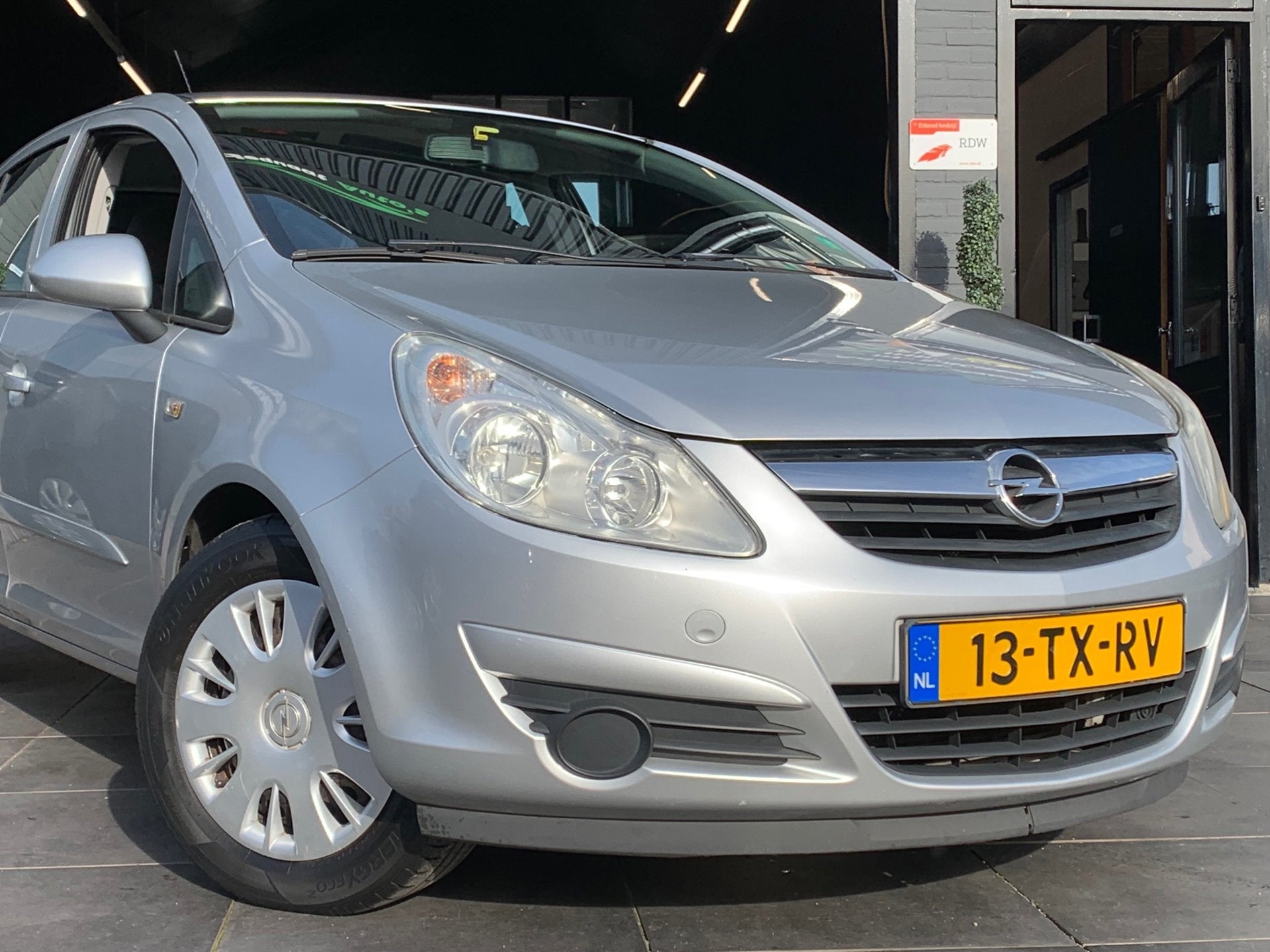 Opel Corsa 1.2-16V Enjoy|2e eig|NAP|Airco|El.Ramen|Trekhaak, Voorwielaandrijving, Stof, Gebruikt, Huisgarantie