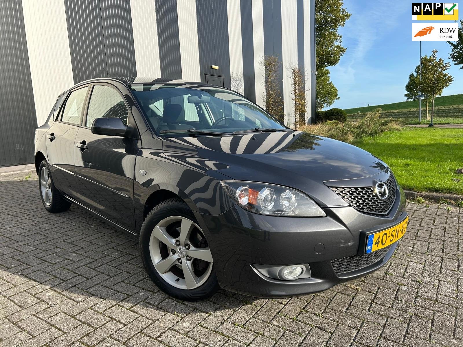 Mazda 3 Sport 1.6 Touring Nw APK-Airco-Lmv-Elekpakket-Trekha, Auto's, Voorwielaandrijving, 1160 kg, Gebruikt, Handgeschakeld