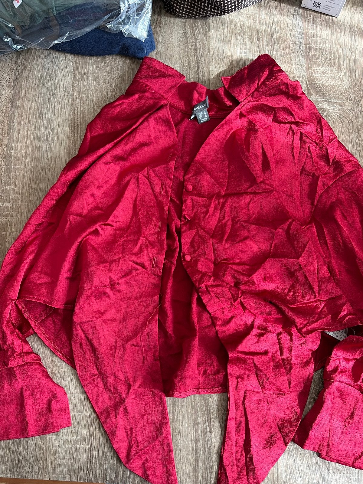 Primark rode blouse met lange mouwen en strikdetail, Ophalen of Verzenden, Zo goed als nieuw, Maat 42/44 (L), Rood