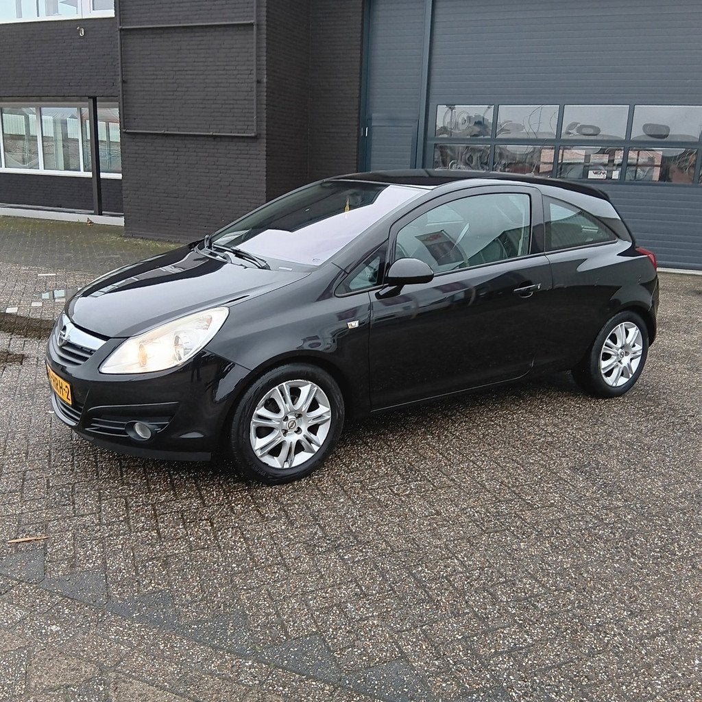 Opel Corsa 1.4-16V Cosmo, Auto's, Opel, Voorwielaandrijving, Gebruikt, 4 cilinders, Lichtsensor
