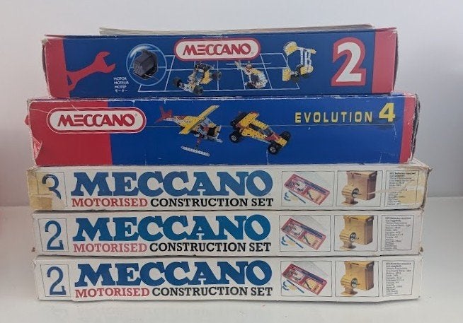 vijf originele Meccano-dozen, Ophalen