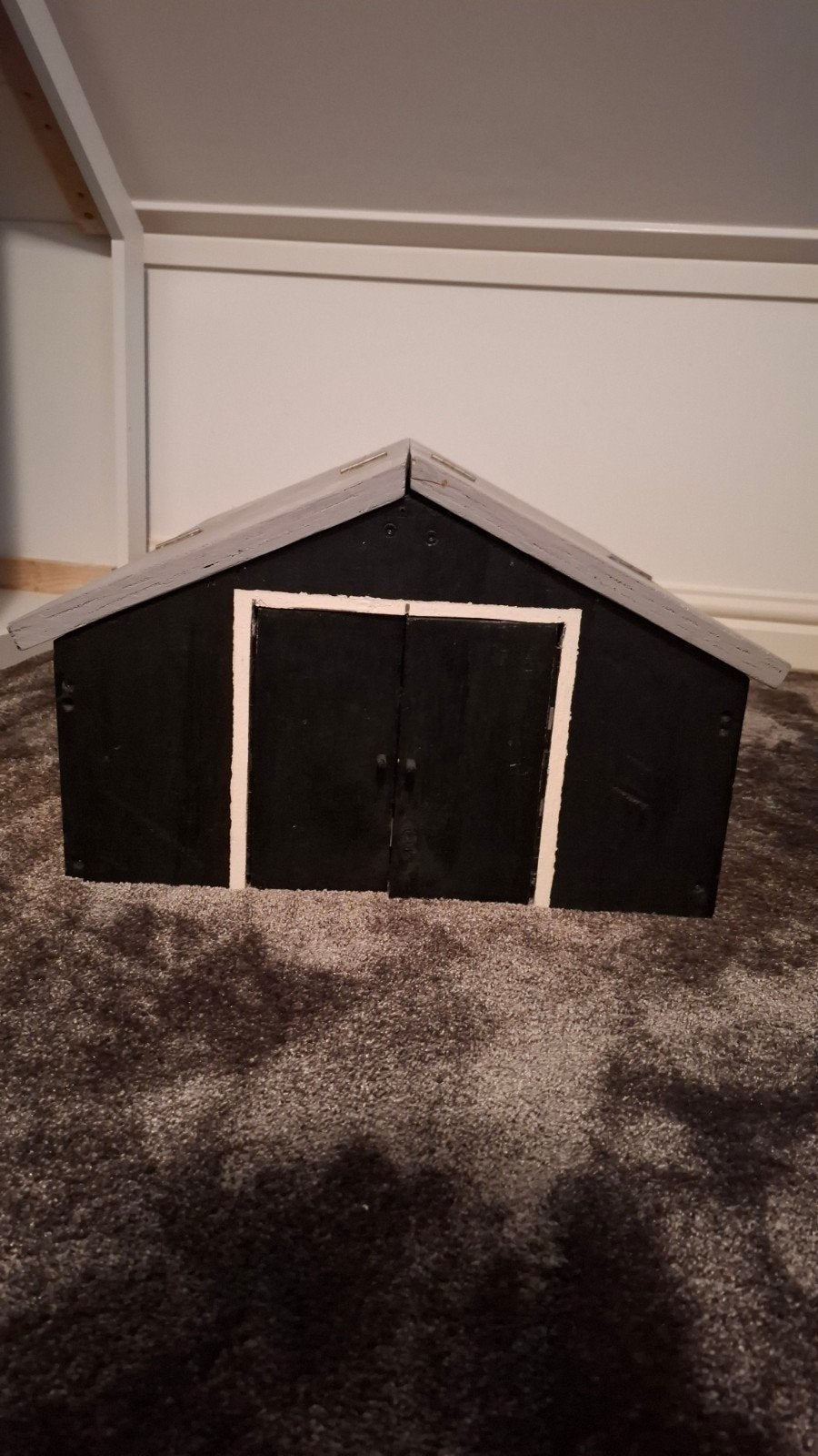 Houten speelgoed schuur, Ophalen